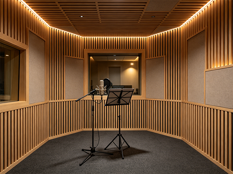 Acoustic wood veneer wall panel for vocal recording booth studio interior decoration