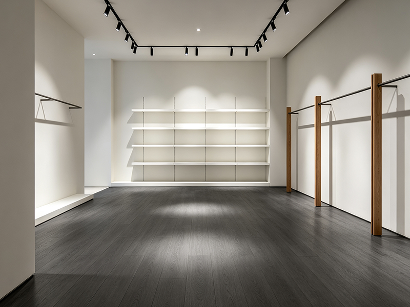 Dark wood grain SPC flooring for clothing boutique showroom, durable waterproof vinyl floor for retail commercial space